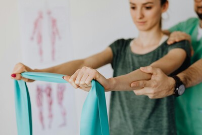 therapeutic exercise and rehabilitation performed with tension band